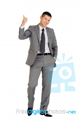 Businessman With Thumb Up Stock Photo