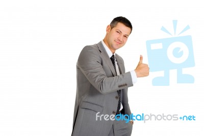 Businessman With Thumb Up Stock Photo