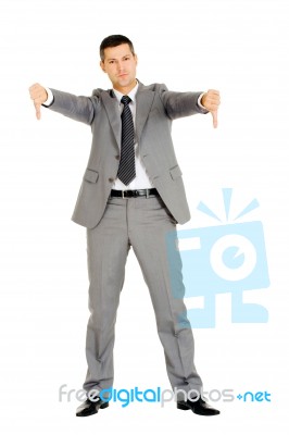 Businessman With Thumbs Down Stock Photo