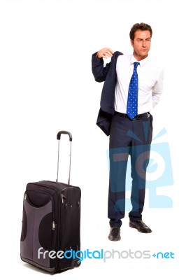 Businessman With Travel Bag Stock Photo