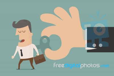 Businessman With Wind-up Key In His Back Stock Image