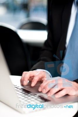 Businessman Working On Laptop Stock Photo