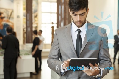 Businessman Working On The Digital Tablet Stock Photo