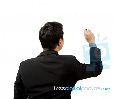 Businessman Writing On Board Stock Photo