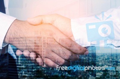 Businessmen Are Shaking Hands Stock Photo