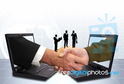 Businessmen Hand Shaking Stock Photo