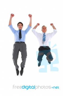 Businessmen Jumping Stock Photo