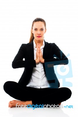 Businesswoman Doing Yoga Stock Photo