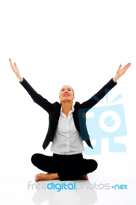 Businesswoman Doing Yoga Stock Photo