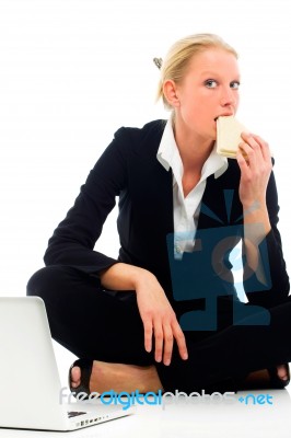 Businesswoman Eating Stock Photo