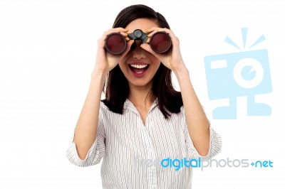 Businesswoman Enjoying View Through Binoculars Stock Photo