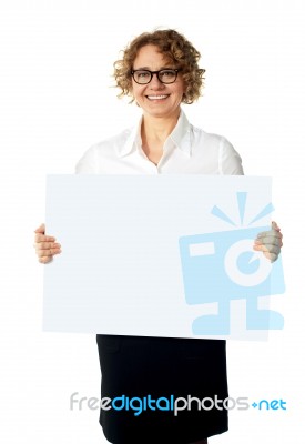 Businesswoman Holding Billboard Stock Photo