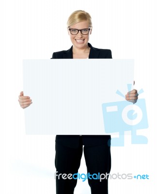 Businesswoman Holding Blank Board Stock Photo