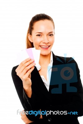 Businesswoman Holding Cards Stock Photo