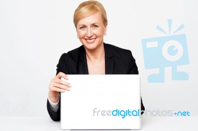 Businesswoman Holding Laptop Stock Photo