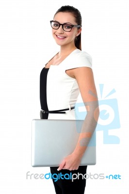 Businesswoman Holding Laptop Stock Photo