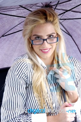 Businesswoman Holding Umbrella Stock Photo