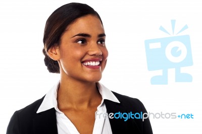 Businesswoman Looking Away With A Smile On Face Stock Photo