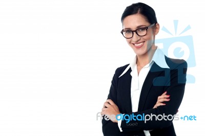 Businesswoman Posing With Arms Folded Stock Photo