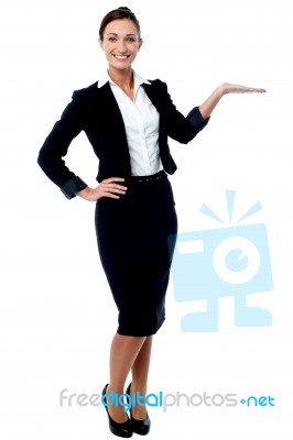 Businesswoman Presenting Something Stock Photo