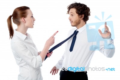 Businesswoman Scolding Her Colleague Stock Photo