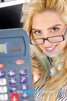 businesswoman Showing Calculator Stock Photo