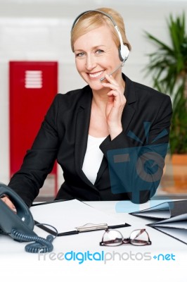 Businesswoman Wearing Headset Stock Photo