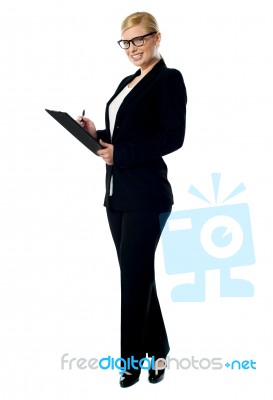 Businesswoman With A Clipboard Stock Photo