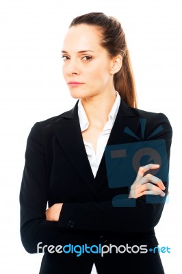 Businesswoman With Arms Crossed Stock Photo