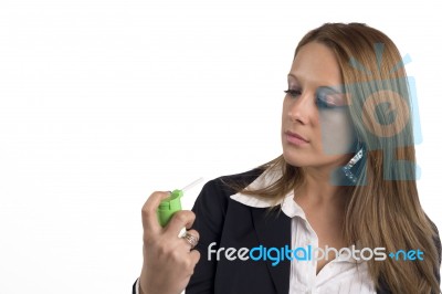 Businesswoman With Asthma Using Inhaler Stock Photo