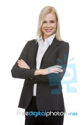 Businesswoman With Folded Arms Stock Photo