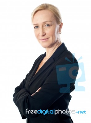 Businesswoman With Folded Arms Stock Photo