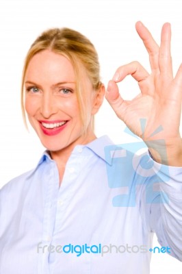 Businesswoman With Ok Sign Stock Photo