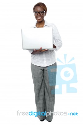 Businesswoman Working On Laptop Stock Photo