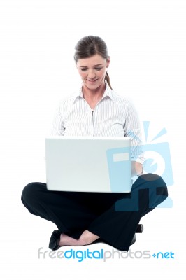 Businesswoman Working On Laptop Stock Photo