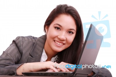 Businesswoman Working On Laptop Stock Photo