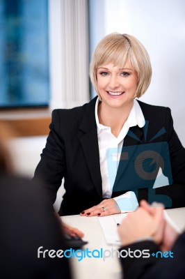 Businesswoman Working With Her Colleagues Stock Photo