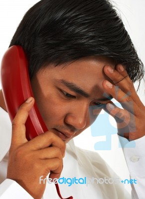 Busy Worker On Telephone Stock Photo