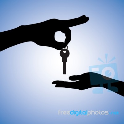 Buyer and seller exchanging key Stock Image