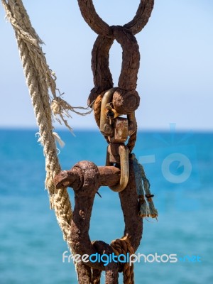 Cabo Pino, Andalucia/spain - May 6 : Rusty Chain And Frayed Rope… Stock Photo