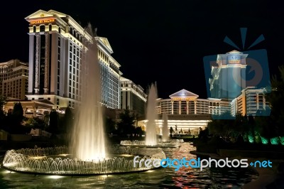 Caesar's Palace Illuminated At Nightime Stock Photo