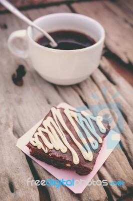 Cake Chocolate Brownie And Hot Coffee On Old Wooden Background Stock Photo