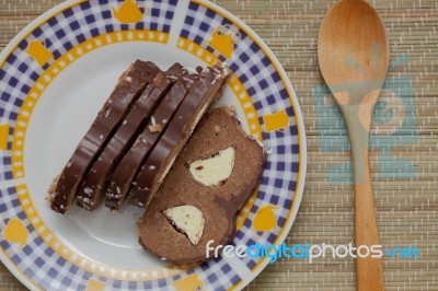 Cakes With Jelly And Coconut With Chocolate Banana Stock Photo