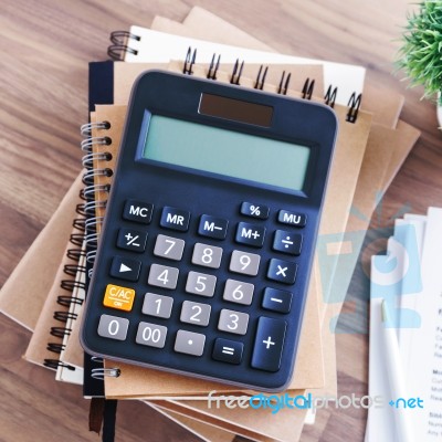 Calculator On Notebook Stock Photo