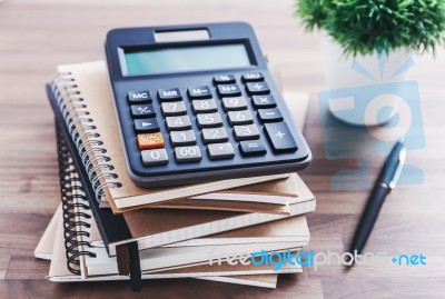 Calculator On Office Desk Stock Photo