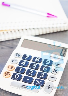 Calculator, Pen And Notepad For Notes Stock Photo