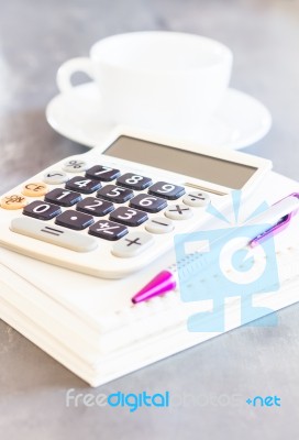 Calculator, Pen And Notepad For Notes Stock Photo