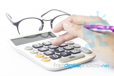 Calculator With Hand Isolated On White Background Stock Photo