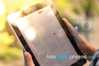 Calendar Or Planner On A Tablet Stock Photo