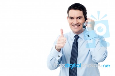 Call Center Agent Showing Thumb Up Stock Photo